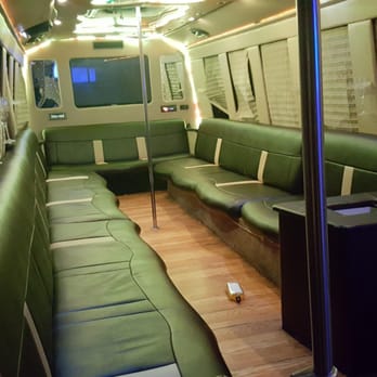 MidWest Limousine - 2012 25 passenger party bus fiber optic multi color lights, 42 in flat screen tv. AM,FM,CD,DVD 5000 WATT SOUND SYSTEM... - Limos Near Me