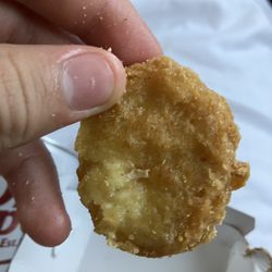 McDonald's - Part of a uncooked chicken nugget
