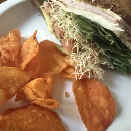 Sandwich on squaw bread and veggies with ham and turkey