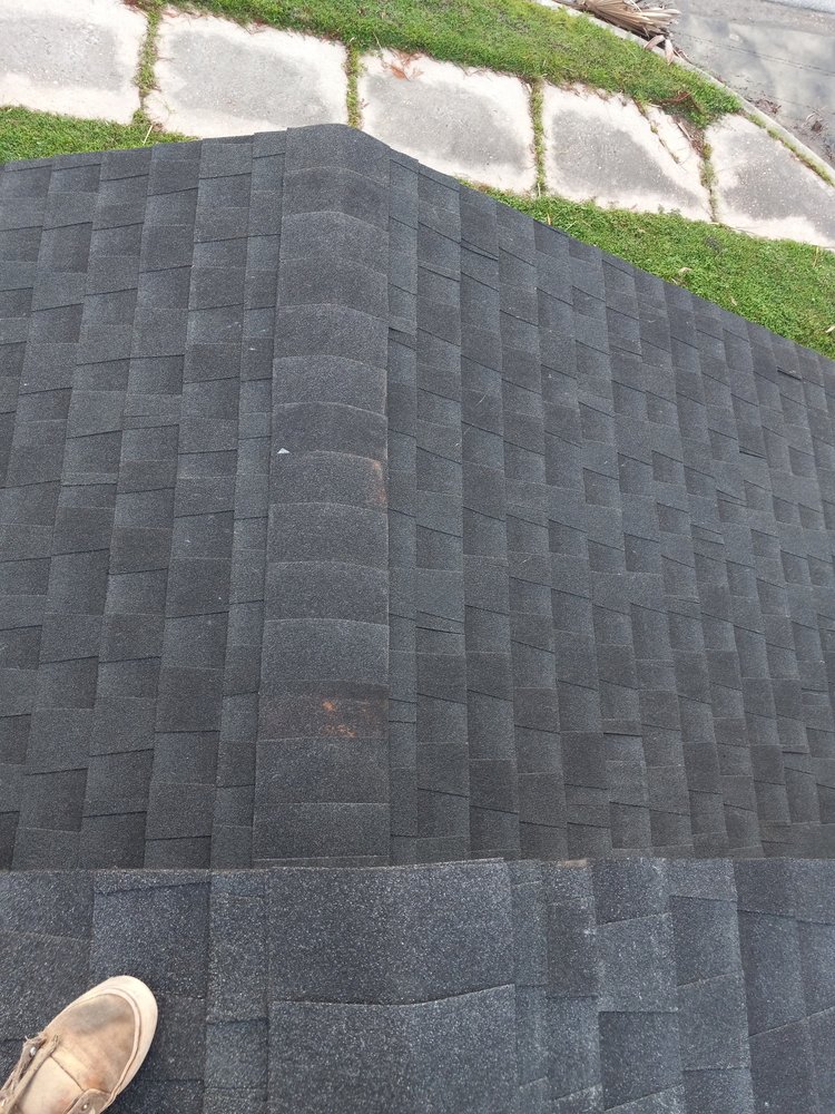 Slide of RCM Roofers