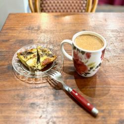 Nina's Cafe - Flavorful Mushroom Frittata and a homemade Sugarfree Oatmilk Chai.