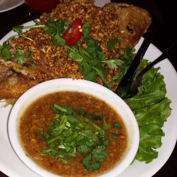 SriPraPhai Thai Restaurant - Red snapper with dried garlic and dipping sauce on side - Thai Near Me - Woodside, New York SriPraPhai Thai Restaurant - Red snapper with dried garlic and dipping sauce on side - Thai Near Me - Woodside, New York
