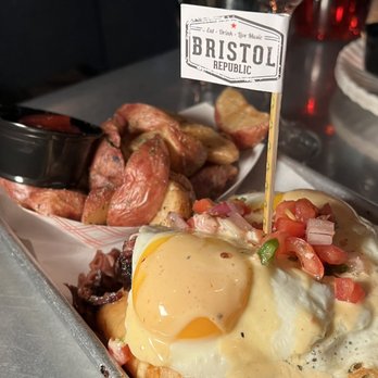 Bristol Republic - Cowboy benedict (has cheddar cornbread and brisket underneath the egg, soo good!) - Bars Near Me - Columbus, Ohio Bristol Republic - Cowboy benedict (has cheddar cornbread and brisket underneath the egg, soo good!) - Bars Near Me - Columbus, Ohio