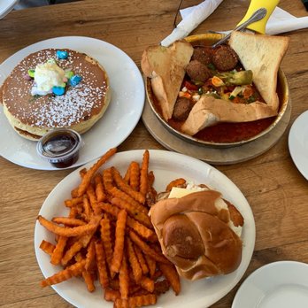 Milkweed - Lucky Charms Pancakes Chicken Sandwich with Sweet Potato Fried Falafel Shakshuka - New American Near Me - Boston, Massachusetts