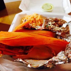 El Triunfo - Carnitas tamales with rice & beans.