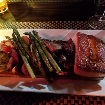 Six Seven Restaurant - Cedar planked king salmon - New American Near Me - Seattle, Washington Six Seven Restaurant - Cedar planked king salmon - New American Near Me - Seattle, Washington