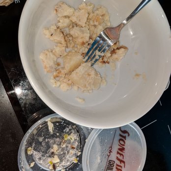 Stonefire Grill - Big chunk of uncooked potato and green onions that I requested to remove but were included. - Barbeque Near Me - Chatsworth, California