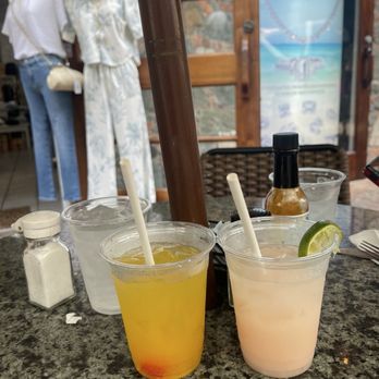 Sun Dog Cafe - Mango Bellini on the left and drunken monkey on the right - Caribbean Near Me - Cruz Bay, Virgin Islands Sun Dog Cafe - Mango Bellini on the left and drunken monkey on the right - Caribbean Near Me - Cruz Bay, Virgin Islands