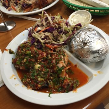 Chicken Maison - Spicy garlic chicken with greek salad and baked potato. - Middle Eastern Near Me - Redondo Beach, California Chicken Maison - Spicy garlic chicken with greek salad and baked potato. - Middle Eastern Near Me - Redondo Beach, California