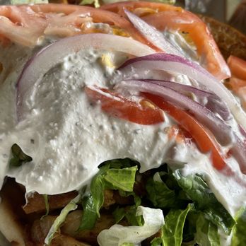 Peño Mediterranean Grill - a chicken sandwich with lettuce, tomatoes, onions, and mayo - Mediterranean Near Me - Wilmington, North Carolina Peño Mediterranean Grill - a chicken sandwich with lettuce, tomatoes, onions, and mayo - Mediterranean Near Me - Wilmington, North Carolina