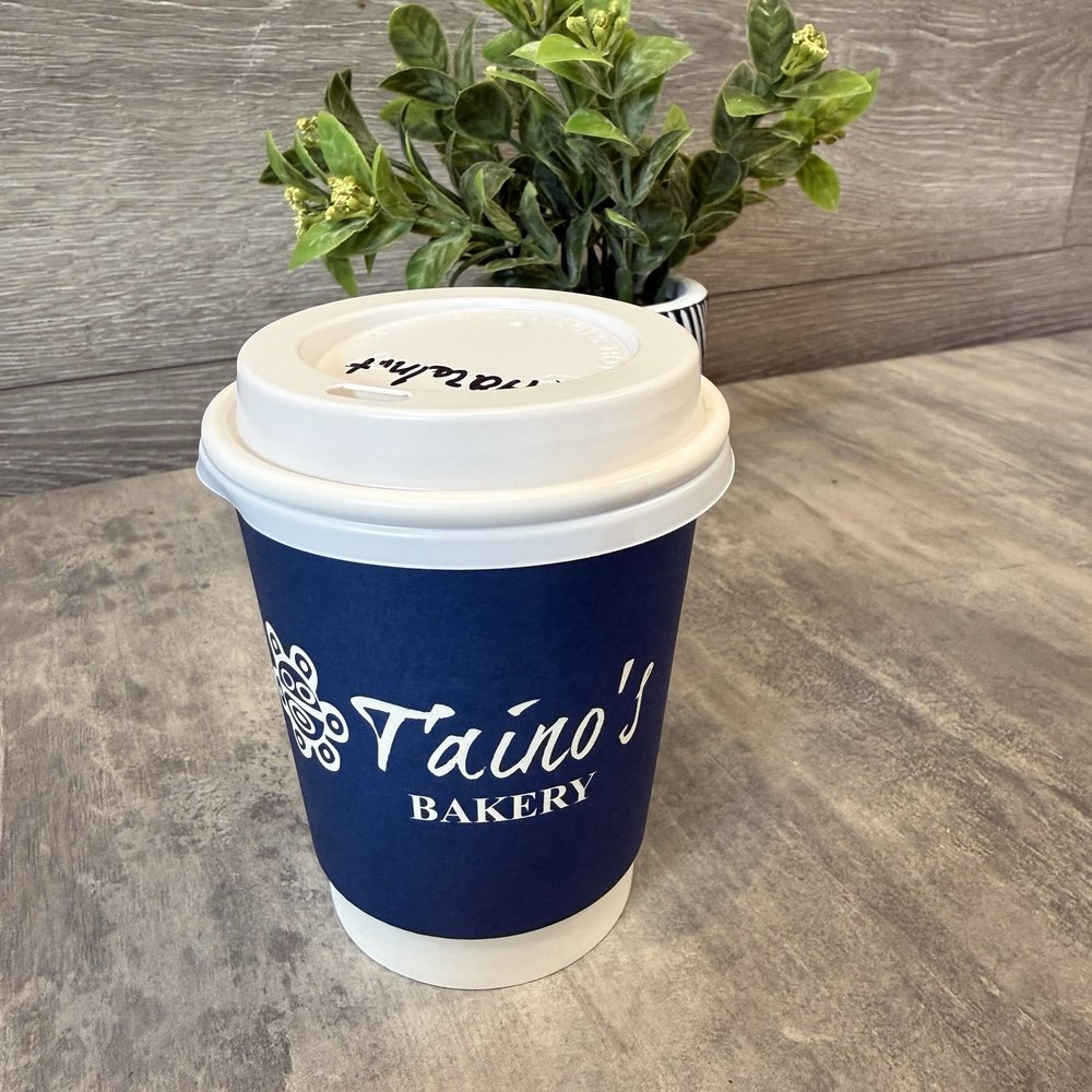 Taino's Bakery & Deli - Cafe con Leche (small with hazelnut) - Bakeries Near Me - Orlando, Florida Taino's Bakery & Deli - Cafe con Leche (small with hazelnut) - Bakeries Near Me - Orlando, Florida