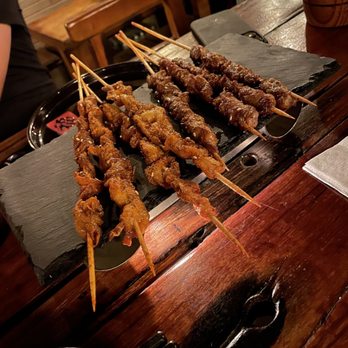 Chat Bar - Chicken skin on the left. It was nice and crispy. Lamb on the right. - Chinese Near Me - Toronto, Ontario