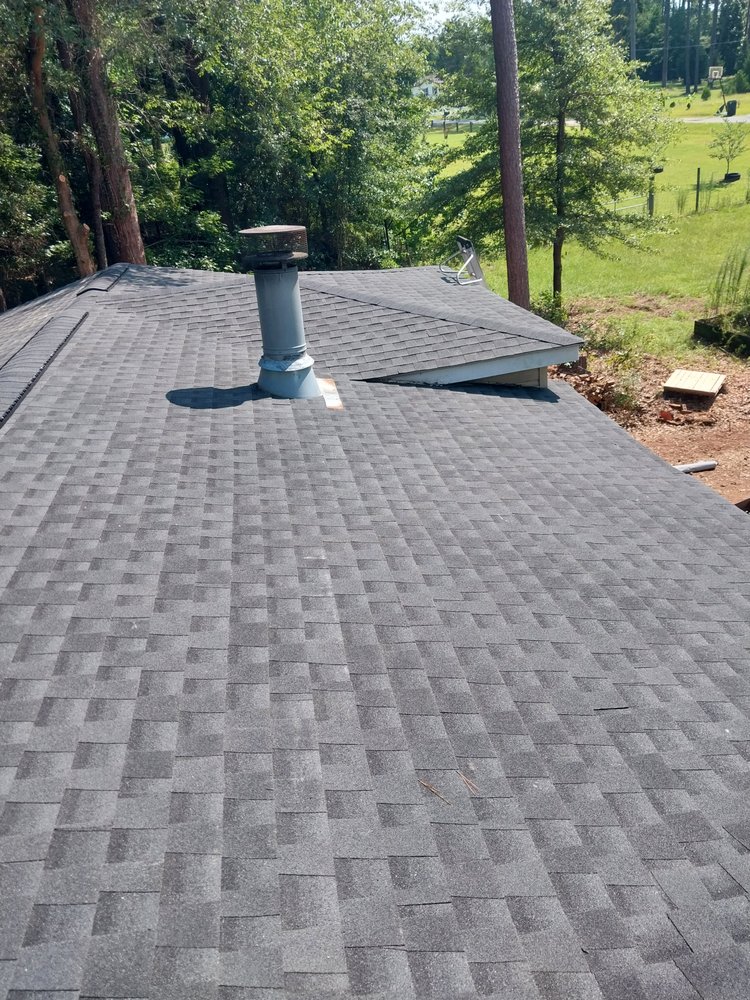 Slide of Tyndal Roofing