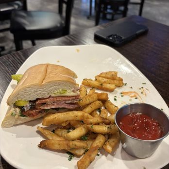 Social House Kitchen and Bar - Oops started eating before Photo. Very good Italian sandwich and crispy fries - Burgers Near Me - Bakersfield, California Social House Kitchen and Bar - Oops started eating before Photo. Very good Italian sandwich and crispy fries - Burgers Near Me - Bakersfield, California