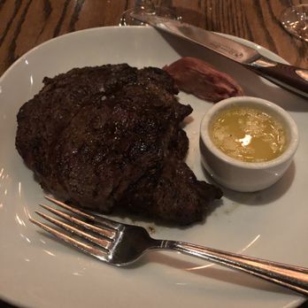 Cuts Steakhouse - 14 oz choice Ribeye steak with garlic butter - Steakhouses Near Me - Atlanta, Georgia Cuts Steakhouse - 14 oz choice Ribeye steak with garlic butter - Steakhouses Near Me - Atlanta, Georgia