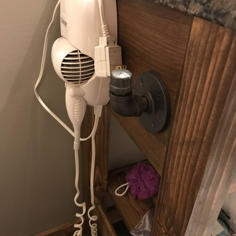 Lakeside Resort - bathroom: hair dryer, shampoo & body gel in attached dispensers in shower - Resorts Near Me - Watkins Glen, New York Lakeside Resort - bathroom: hair dryer, shampoo & body gel in attached dispensers in shower - Resorts Near Me - Watkins Glen, New York