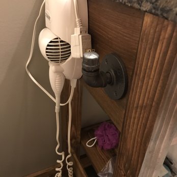 Lakeside Resort - bathroom: hair dryer, shampoo & body gel in attached dispensers in shower - Resorts Near Me - Watkins Glen, New York Lakeside Resort - bathroom: hair dryer, shampoo & body gel in attached dispensers in shower - Resorts Near Me - Watkins Glen, New York