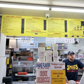 5 Points Restaurant - a man standing at the counter - Fast Food Near Me - North Chicago, Illinois 5 Points Restaurant - a man standing at the counter - Fast Food Near Me - North Chicago, Illinois