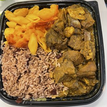 Jamaican Breeze - What I received: rice & peas, Mac & cheese and curried goat. The only thing was correct was the rice. - Caribbean Near Me - Alexandria, Virginia Jamaican Breeze - What I received: rice & peas, Mac & cheese and curried goat. The only thing was correct was the rice. - Caribbean Near Me - Alexandria, Virginia