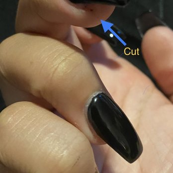 Posh Nails & Spa - Photo shows cut on finger. Mail looks crooked too - Waxing Near Me - Riverside, California Posh Nails & Spa - Photo shows cut on finger. Mail looks crooked too - Waxing Near Me - Riverside, California