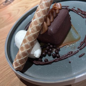 Broma - Chocolate mousse cake: liked the presentation with the rolled thin waffle cookie and textures with the tiny chocolate pellets. 4 stars - New American Near Me - Mountain View, California