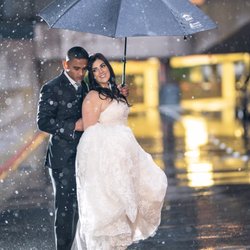 Darren Caballero Photography - A little rain would never stop true love.