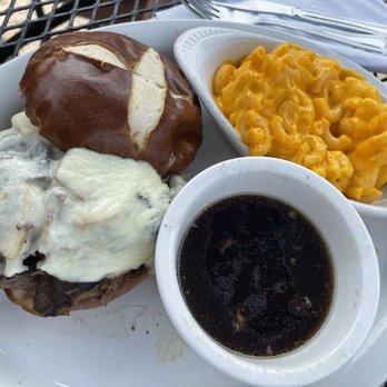 Roosters Bar N Grill - Pot roast sandwich on a pretzel roll with Mac-n-Cheese - Venues & Event Spaces Near Me - Bloomingdale, Illinois Roosters Bar N Grill - Pot roast sandwich on a pretzel roll with Mac-n-Cheese - Venues & Event Spaces Near Me - Bloomingdale, Illinois