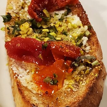 Fat Olives - Toasted bread,  goat cheese, pistachios,  local honey,  San Marzano tomatoes,  basil,  black pepper - Pizza Near Me - Flagstaff, Arizona