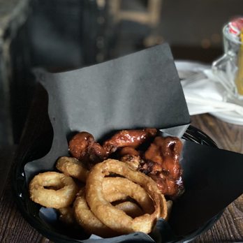Mad Hatter Pub - a basket of onion rings - Pubs Near Me - Montreal, Quebec Mad Hatter Pub - a basket of onion rings - Pubs Near Me - Montreal, Quebec