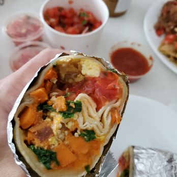 TNT Taqueria - Breakfast burrito with papas dulce: sweet potato, kale - Mexican Near Me - Seattle, Washington TNT Taqueria - Breakfast burrito with papas dulce: sweet potato, kale - Mexican Near Me - Seattle, Washington