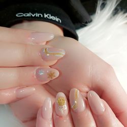 Alexa's Dominican Salon and Barber  - Nude nails with gold flower nail art - Alexa's Dominican Salon, Port Reading NJ