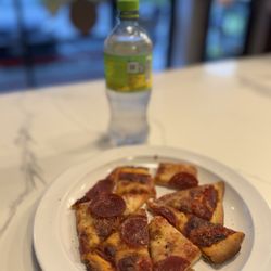 Leona's Pizzeria Lyons - THIN Pepperoni Slice