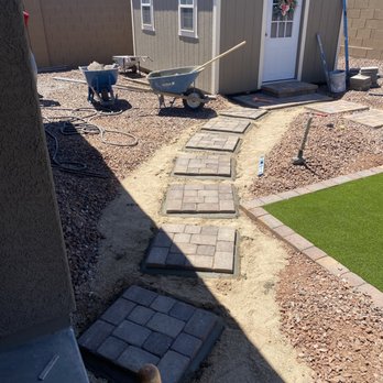 Janda Landscape - a backyard with a wheelbarrow and pavers - Landscaping Near Me Janda Landscape - a backyard with a wheelbarrow and pavers - Landscaping Near Me
