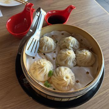 Serious Sanji - Pork soup dumplings, $11.95. - Bubble Tea Near Me - Northbrook, Illinois Serious Sanji - Pork soup dumplings, $11.95. - Bubble Tea Near Me - Northbrook, Illinois