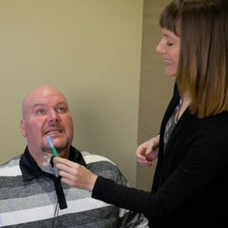 Eugene Speech Therapy - Using a stimulation technique.
