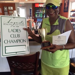 Club champion. Free parking space for one year
