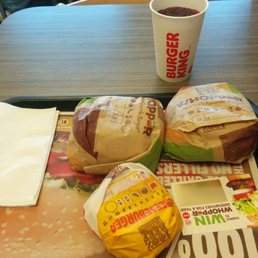 Two Whoppers, a cheeseburger, and a value-sized drink. Two Whoppers, a cheeseburger, and a value-sized drink.