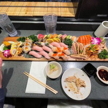 Sakura Sushi - Scallops, yellowtail, albacore, salmon, uni, las vegas roll, and rainbow roll. - Japanese Near Me - Phoenix, Arizona