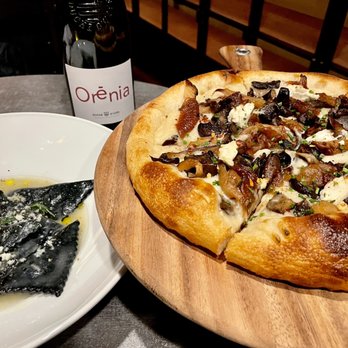 Coletta - "squid" ink ravioli and the truffle pizza. - Vegan Near Me - New York, New York