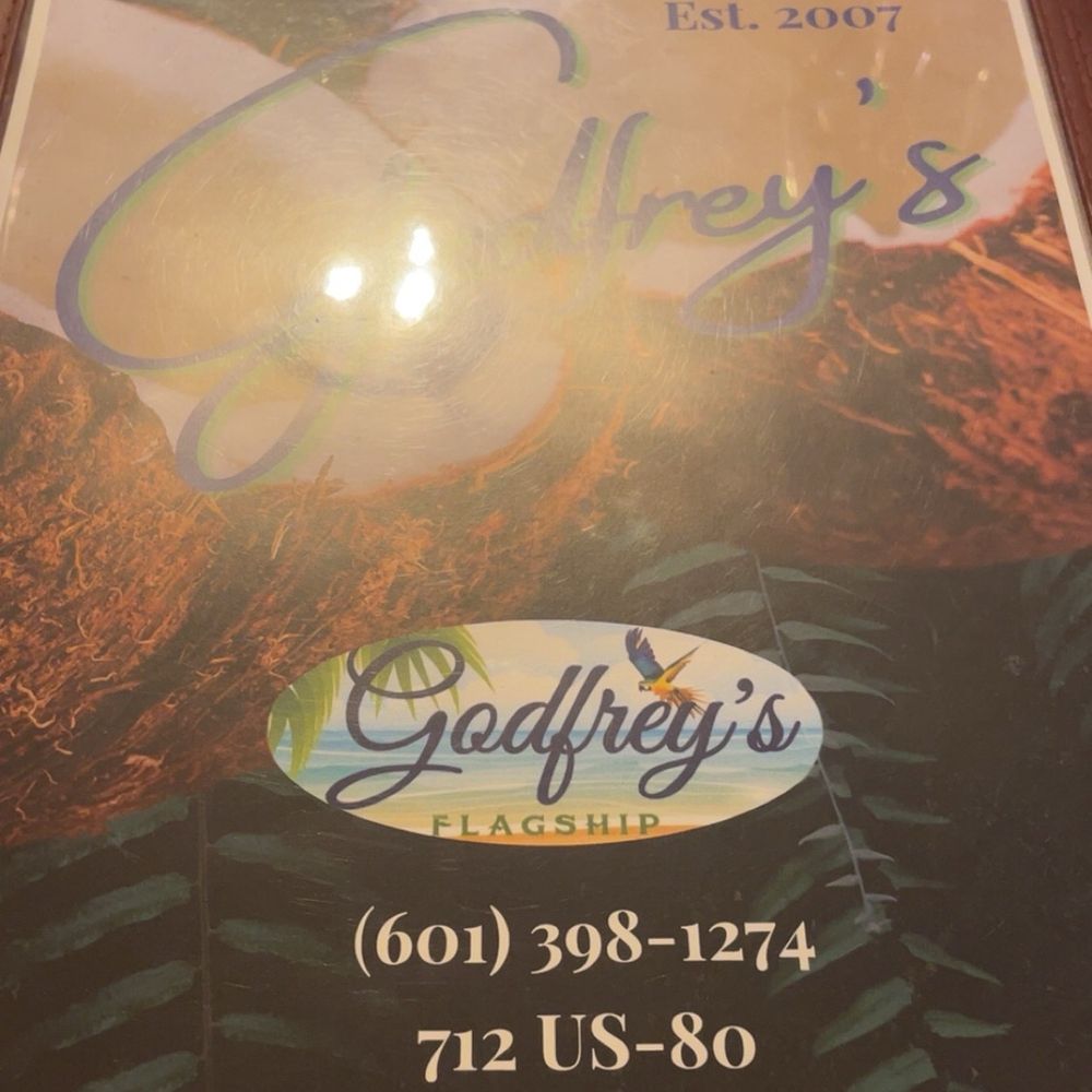 Godfreys - Menu w/ number & location - Caribbean Near Me - Flowood, Mississippi