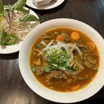 Saigon Noodles & Grill - 39. Beef Stew with Rice Noodles Soup - Vietnamese Near Me - Arlington, Virginia Saigon Noodles & Grill - 39. Beef Stew with Rice Noodles Soup - Vietnamese Near Me - Arlington, Virginia