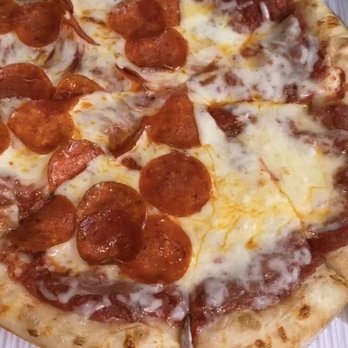 Zito's Pizza - It was supposed to be HALF pepperoni, but I'll take the extra! Haha. Still good and beautiful.  Lite Baked. - Pizza Near Me - Orange, California
