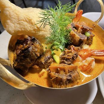 Poor Calvin's - Oxtail and seafood dish - Asian Fusion Near Me - Atlanta, Georgia Poor Calvin's - Oxtail and seafood dish - Asian Fusion Near Me - Atlanta, Georgia
