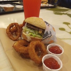Habit Burger & Grill - Yummy, teriyaki burger with freshly frien onion rings and a Strawberry Lemonade