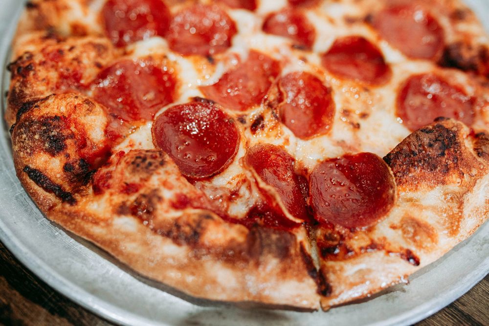 Cutters Pizzeria of Alexandria Logo