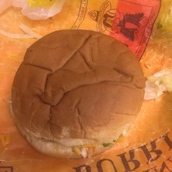 Taco Casa - a burger and chips on a plastic wrapper - Mexican Near Me - Garland, Texas Taco Casa - a burger and chips on a plastic wrapper - Mexican Near Me - Garland, Texas