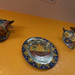 a bull and a plate a bull and a plate