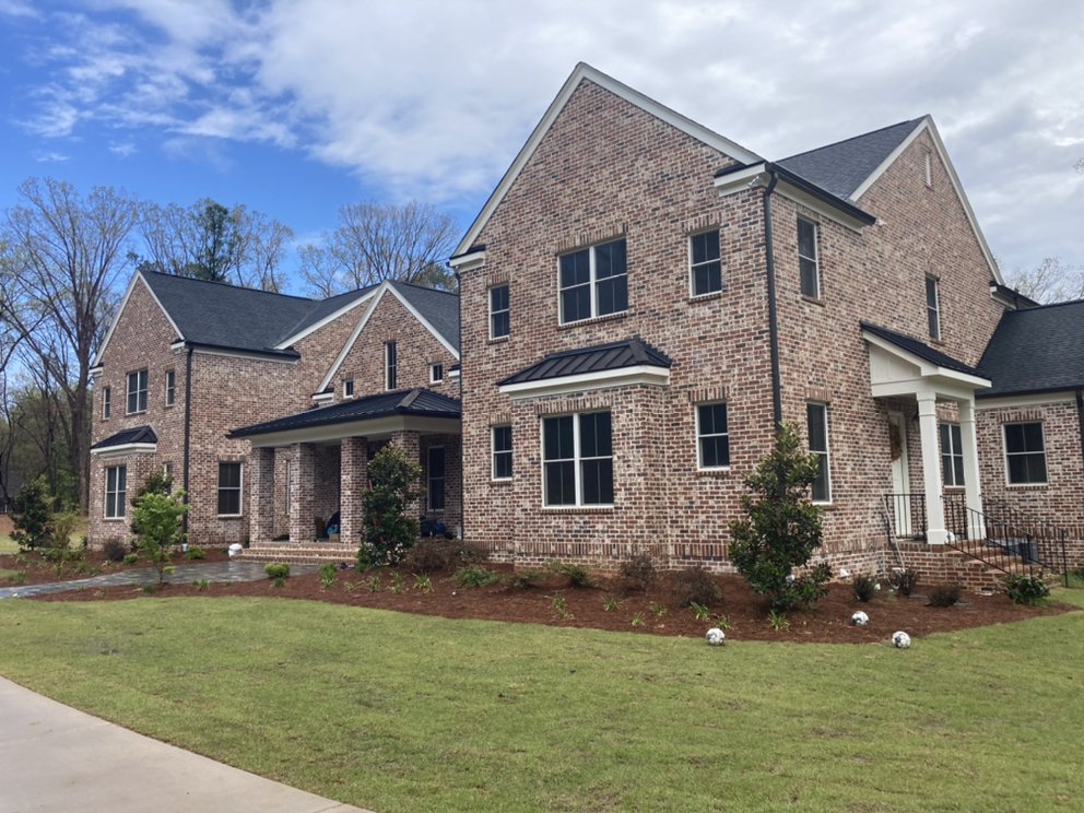 Slide of Gutter Guys Construction