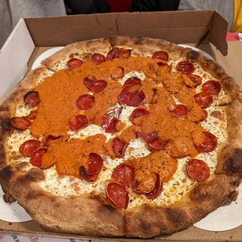 Andrew Bellucci's Pizzeria - Vodka-roni pizza, small round pie pictured here. Pepperoni pizza topped with their signature vodka sauce. Very good! - Pizza Near Me - Astoria, New York Andrew Bellucci's Pizzeria - Vodka-roni pizza, small round pie pictured here. Pepperoni pizza topped with their signature vodka sauce. Very good! - Pizza Near Me - Astoria, New York