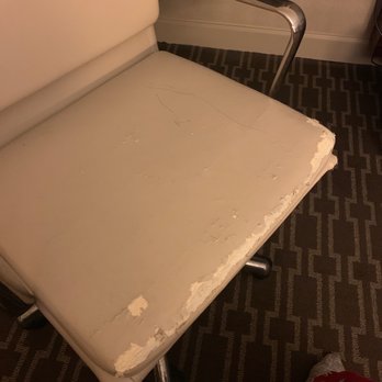 Hilton McLean Tysons Corner - Ripped chair with pen - Hotels Near Me - Mclean, Virginia